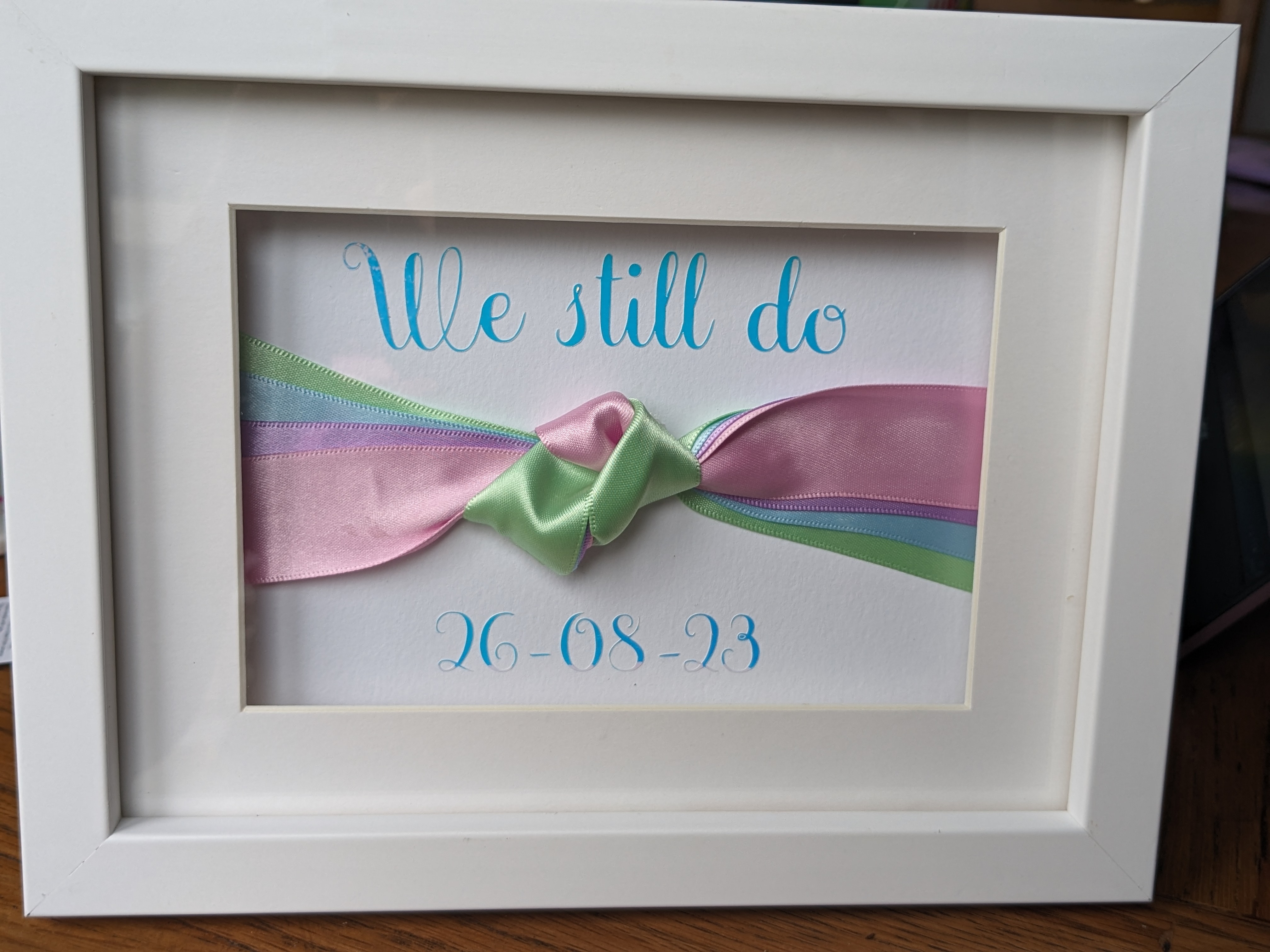 Deb Reed Celebrant Colchester Essex, playing the Mr & Mrs paddle game at the vowel renewal of Gary and Kelly.